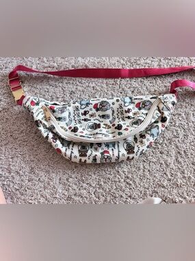 The Santa Clause themed Holiday Print belt bag with red Strap